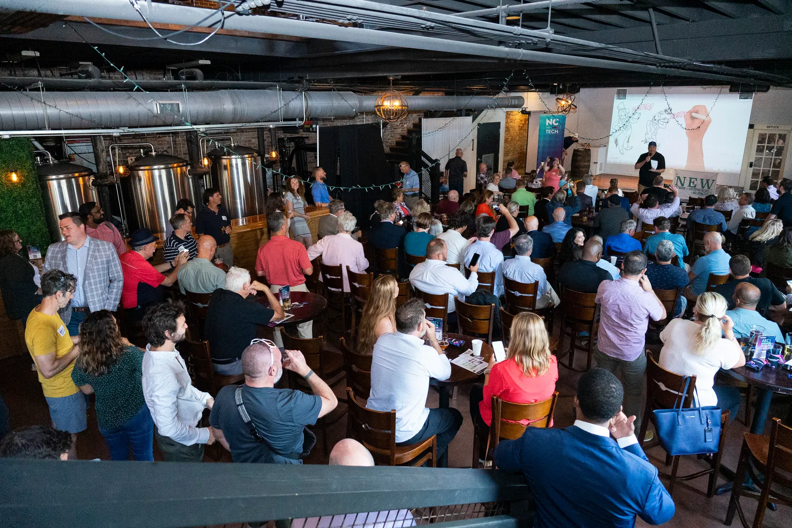 In Case You Missed It:
The ABCs of New Technology event in Wilmington, NC
Hosted by the Network of Entrepreneurs Wilmington and NC Tech.
---
Over 250 people in attendance (the largest monthly event in the state). Founders and CEOs of local startups (Lapetus Solutions, Raleon, Telios) talk about AI, Blockchain, and ChatGPT. We hope to see you at our next event. 